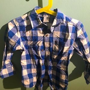 Whit and blue cotton shirt and brown cotton pants